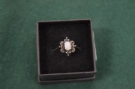 A decorative silver ring.