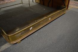 A brass fender.