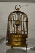 A bird cage clock.