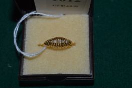 An 18ct gold and diamond ring.
