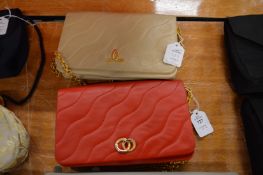 Two ladies quilted leather handbags.