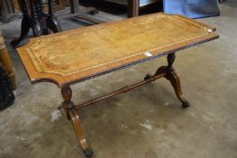 Leather inset coffee table.