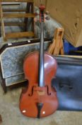 A cello with bow and case.