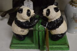 A pair of novelty cast iron bookends modelled as pandas.