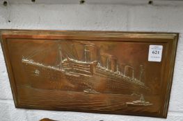 An embossed copper plaque depicting The Queen Mary.