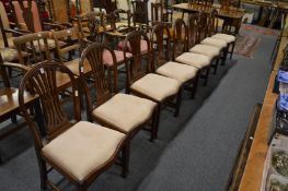 A set of eight Hepplewhite style mahogany dining chairs.