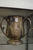 A large silver tyg shaped trophy cup.