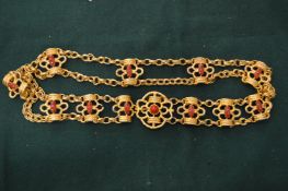 A Kenneth Lane gilt metal belt.