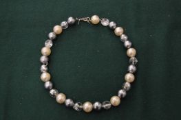 A Kenneth Lane vintage necklace.