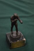 A small bronze boxing trophy on marble base.