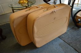 A suite of Maserati tan leather luggage.