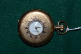 A 9ct gold half hunter pocket watch.