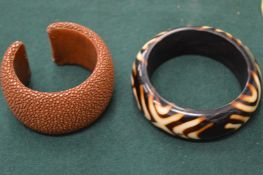 Two decorative bangles.