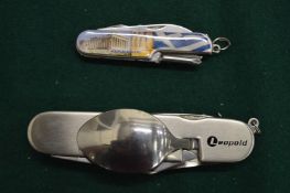 A camping knife, fork and spoon set and another multi-knife.
