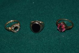 Three 18ct gold dress rings.