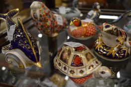 A group of five Royal Crown Derby animals and birds.