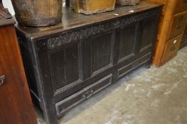 An 18th century oak mule chest.