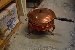A copper chafing dish with original box.