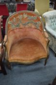 A large beech framed French fauteuil.