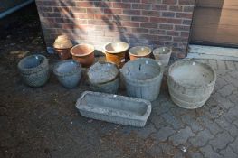 Six various garden pots.