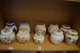 A collection of decorative porcelain ginger jars.