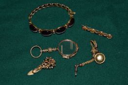 Decorative gilt metal jewellery and other items.