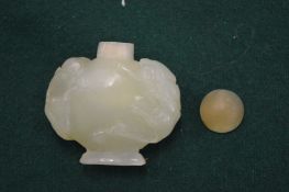 Carved jadeite snuff bottle.