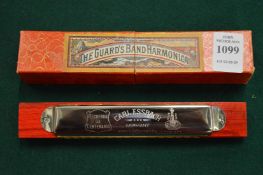 A boxed harmonica.