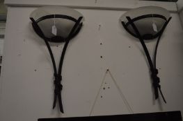 A pair of stylish wall lights.