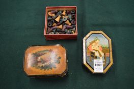 A lacquer box, painted wooden box and gaming counters.