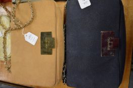 Two ladies handbags.