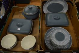 A quantity of Denby blue ground pottery dinnerware.