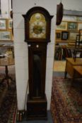 An oak cased grandmother clock with Westminster chime.