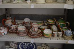 Oriental tea services.