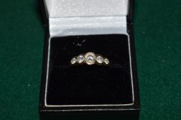 A 9ct gold and cz ring.