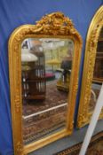 A Victorian style gilt framed pier mirror.