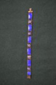 A silver and enamel bracelet.