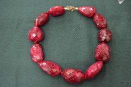 A chunky bead necklace.