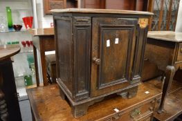 A small oak cupboard.