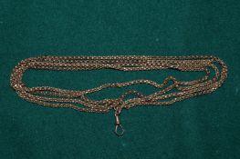 A muff chain with 9ct gold clasp.