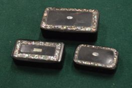 Three papier mache snuff boxes.