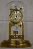 Brass anniversary style clock with glass dome.