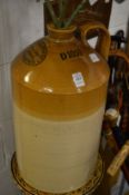 W S Phillips & Co, Carmarthen, Wine and Spirit Merchants, a large glazed wine flagon.