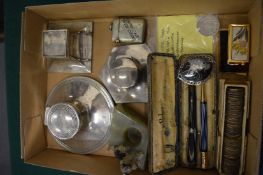 Three silver capstan inkwells, pens, cigarette lighters and other collectables.
