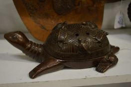 A Chinese bronze censer modelled as a tortoise.