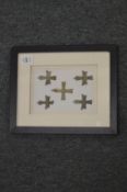 Small bronze crosses, framed and glazed.