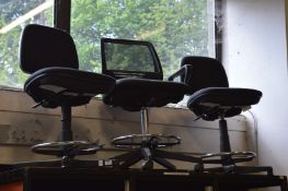 Three office chairs.
