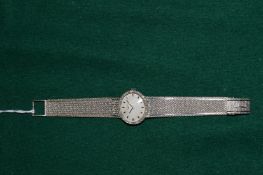 Ladies 18ct white gold and diamond wristwatch.