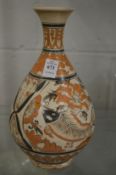 A Chinese bottle vase painted with fish.