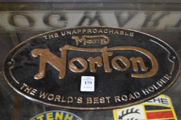 A cast iron sign Norton.